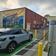 A Volkswagen ID.4 electric car using a public charging station in the municipal parking lot in Blairsville, Ga., Sept. 7, 2024. (Credit: Chris Hardesty)