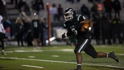 Collins Hill's Spenser Anderson (6) scores a touchdown during a GHSA high school football game between the Collins Hill Eagles and the Grayson Rams at Collins Hill High in Suwanee, GA., on Friday, December 3, 2021. (Photo/ Jenn Finch)