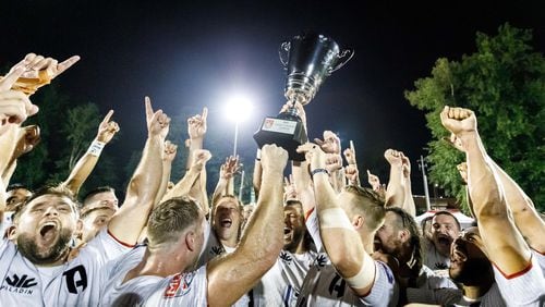 Members of  Rugby ATL celebrate a 10-9 victory over Rugby United New York in the Eastern Conference finals Saturday. Rugby ATL will play for the Major League Rugby championship on Aug. 1.