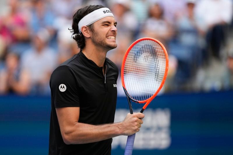 Taylor Fritz, of the United States, reacts in the fourth set against Alexander Zverev, of Germany, during the quarterfinals of the U.S. Open tennis championships, Tuesday, Sept. 3, 2024, in New York. (AP Photo/Kirsty Wigglesworth)