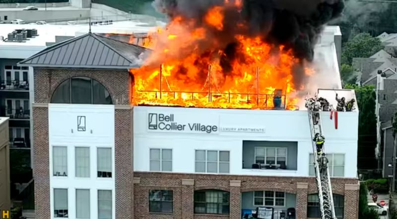 The fourth floor and roof partially collapsed after a massive fire tore through an apartment complex in northwest Atlanta on Saturday night.