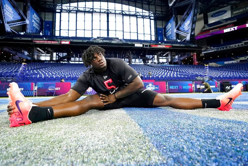 Georgia defensive lineman Jordan Davis (05) warms up at the NFL football scouting combine in Indianapolis, Saturday, March 5, 2022. (AP Photo/Steve Luciano)