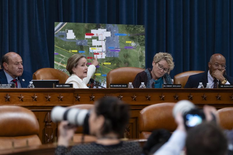 From left, Rep. Lou Correa, D-Calif., Rep. Madeleine Dean, D-Pa., Rep. Chrissy Houlahan, D-Pa., and Rep. Glenn Ivey, D-Md., ask questions in front of a site map at the first public hearing of a bipartisan congressional task force investigating the assassination attempts against Republican presidential nominee former President Donald Trump, at Capitol Hill in Washington, Thursday, Sept. 26, 2024. (AP Photo/Ben Curtis)