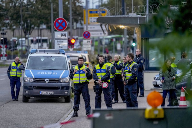 German police officers gather at the border between Germany and France in Kohl, Germany, Monday, Sept. 16, 2024 as Germany controls all his borders from Monday on. (AP Photo/Michael Probst)