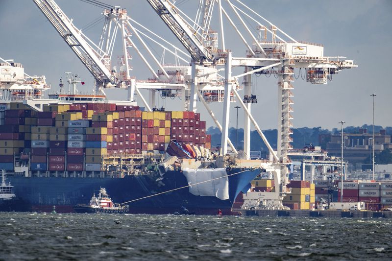 The container ship Dali pulls away from the Seagirt Marine Terminal on its way to Norfolk, Monday, June 24, 2024, nearly three months after the ship hit a support pier of the Francis Scott Key Bridge causing a catastrophic collapse. (Jerry Jackson/The Baltimore Sun via AP)