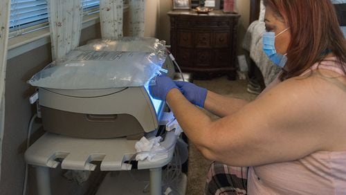 Maria Duenas, 60, has kidney failure and is on the kidney transplant list. But until she finds a match, she will administer her own dialysis treatment at home. (Heidi de Marco/Kaiser Health News/TNS)