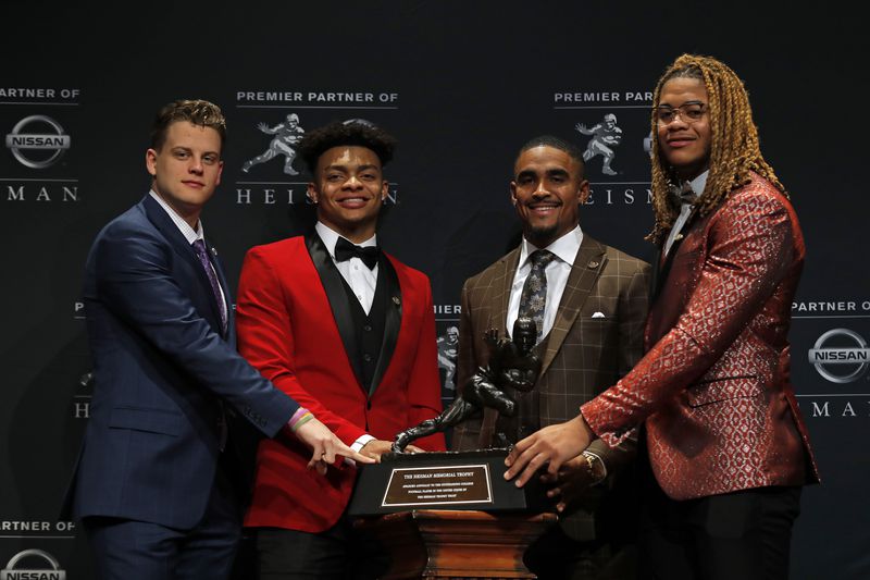 Finalists for the 85th annual Heisman Memorial Trophy, quarterback Joe Burrow of the LSU Tigers, quarterback Justin Fields of the Ohio State Buckeyes, quarterback Jalen Hurts of the Oklahoma Sooners and defensive end Chase Young of the Ohio State Buckeyes. (Photo by Adam Hunger/Getty Images)