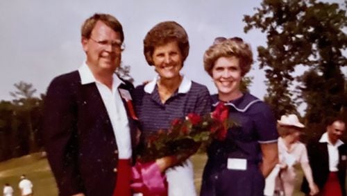 Butch Hansen with wife Mary Ann Hansen surround Kathy Whitworth, who won the 1982 Lady Michelob Classic hosted by Hansen at Brookfield West.