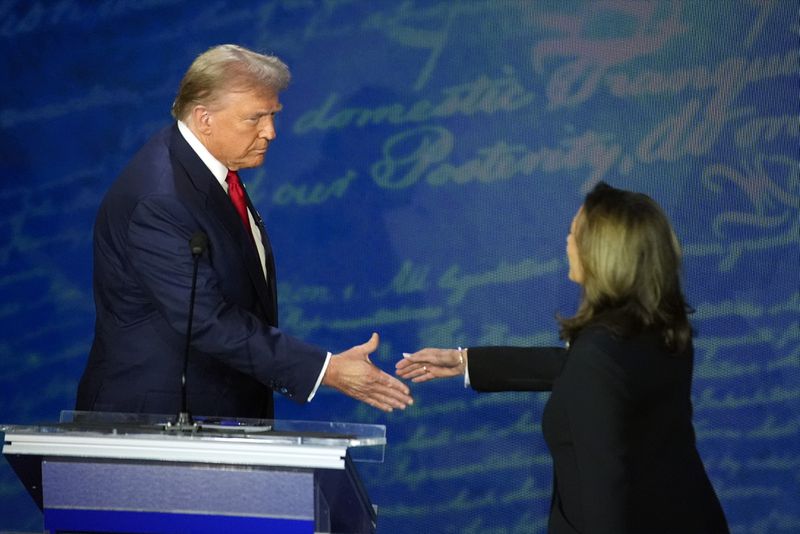 Republican presidential nominee former President Donald Trump shakes hands with Democratic presidential nominee Vice President Kamala Harris during an ABC News presidential debate at the National Constitution Center, Tuesday, Sept.10, 2024, in Philadelphia. (AP Photo/Alex Brandon)