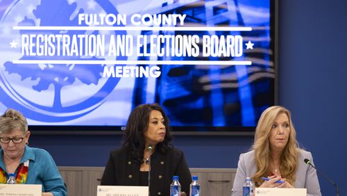 Fulton County's election board on Thursday reaffirmed a plan to hire a team to monitor election activities this year. The State Election Board has not approved the plan, and Fulton election board Chair Sherri Allen, center, said state board members want to appoint the monitors themselves, although she said she has received nothing in writing. Fulton County election board member Julie Adams, right, opposed the plan and said the fact that the state board had not voted on it “speaks volumes.” (File photo by Ben Gray / Ben@BenGray.com)