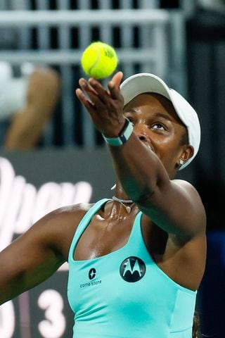 Sloane Stephens toses the ball for a serve against Taylor Townsend during an exhibition match in the Atlanta Open at Atlantic Station on Sunday, July 21, 2024, in Atlanta,
(Miguel Martinez / AJC)