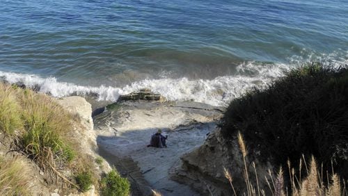 A beachgoer enjoys the water by Aniso Trail between California&apos;s Refugio State Beach and El Capitan State Beach on May 20, 2017. (Denise Florez/Los Angeles Times/TNS)