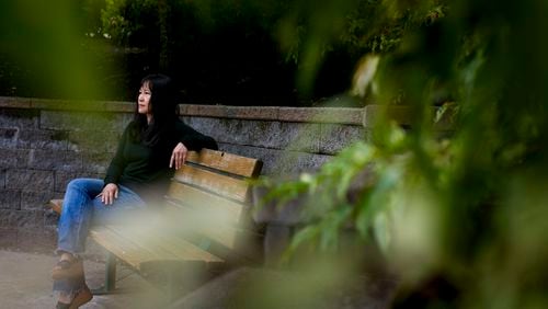 Ellen Lo Hoffman, the co-founder of Soul Reparations, a nonprofit providing free spiritual support to women, poses for a portrait near her home Wednesday, Aug. 21, 2024, in Bothell, Wash. (AP Photo/Lindsey Wasson)