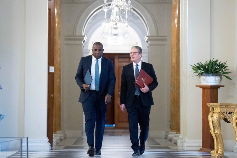 Britain's Prime Minister Keir Starmer, right, and Foreign Secretary David Lammy at the British ambassador's residence in Washington, Friday Sept. 13, 2024, before their meeting with US President Joe Biden. (Stefan Rousseau/Pool via AP)