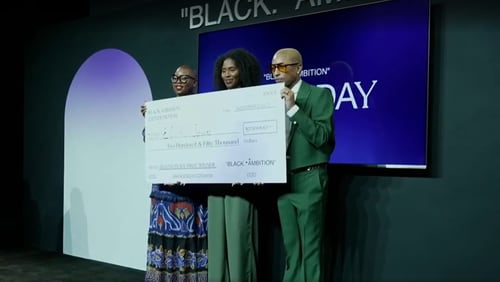 Maïré Bavarday-Rosa (center), co-founder and CEO of Atlanta-based logistics hub ECOMSPACES, stands with Felecia Hatcher (left), CEO of Black Ambition, and Pharrell Williams (right) after winning $250,000 at the Black Ambition Demo Day on Thursday, Nov. 9, 2023.