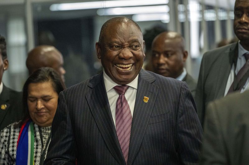 South African President Cyril Ramaphosa leaves the National Results Operations Center following the formal announcement of the results in South Africa's general elections in Johannesburg, South Africa, Sunday, June 2, 2024. Humbled by a stinging election result, South Africa's African National Congress was talking to everyone in an effort to form a stable coalition government for Africa's most advanced economy after it lost its 30-year majority. (AP Photo/Jerome Delay)
