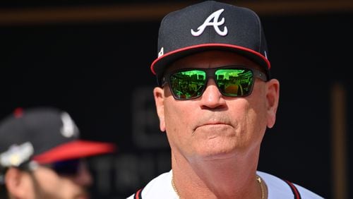 Atlanta Braves manager Brian Snitker surveys the field before game one of the baseball playoff series between the Braves and the Phillies at Truist Park in Atlanta on Tuesday, October 11, 2022. (Hyosub Shin / Hyosub.Shin@ajc.com)