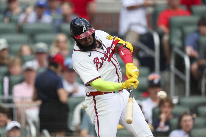 Atlanta Braves designated hitter Marcell Ozuna hits a double during the first inning against the Detroit Tigers at Truist Park, Monday, June 17, 2024, in Atlanta. (Jason Getz / AJC)
