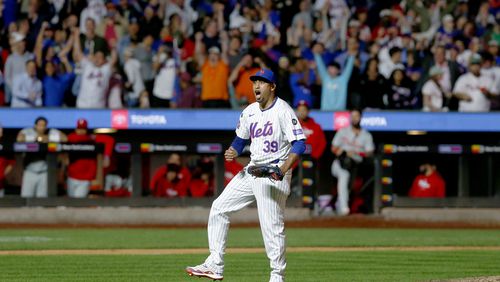 New York Mets relief pitcher Edwin Diaz reacts after striking out Kody Clemens for the final out during a baseball game against the Philadelphia Phillies, Sunday, Sept. 22, 2024, in New York. (AP Photo/John Munson)