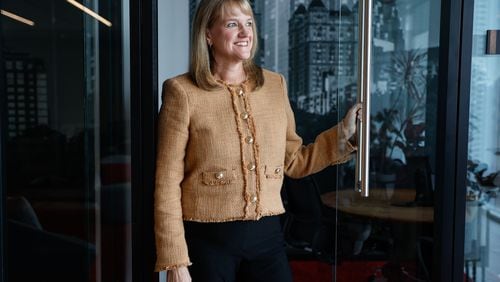 Laura Miles, the new Atlanta-based chief client officer and global head of industries at Bain & Company poses for a portrait at Bain's Midtown offices on Tuesday, July 23, 2024.  (Natrice Miller/ AJC)