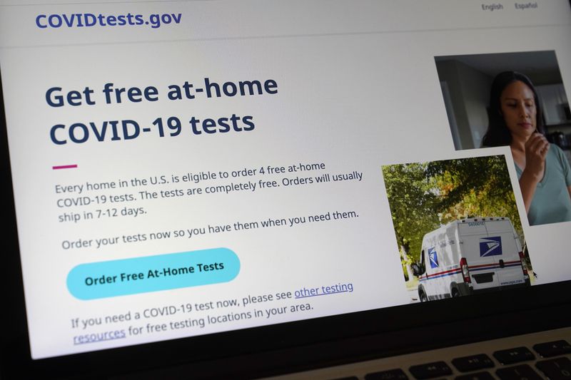 FILE - A United States government website, COVIDTests.gov, is displayed on a computer, Jan. 19, 2022, in Walpole, Mass. (AP Photo/Steven Senne, File)