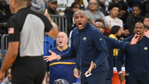 Wheeler head coach Larry Thompson reacts to a call during the second half of GHSA Class 7A Semifinal basketball game at GSU’s Convocation Center, Saturday, Mar. 2, 2024, in Atlanta. (Hyosub Shin / Hyosub.Shin@ajc.com)