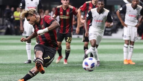 Atlanta United forward Josef Martinez scores his third goal of the night on a penalty kick for the hat trick and a 3-1 victory against Philadelphia Union during the second half in a MLS soccer match on Saturday, June 2, 2018, in Atlanta. Martinez is now tied for the MLS record for career hat tricks with 5. He is the fastest player in MLS history to achieve this.    Curtis Compton/ccompton@ajc.com