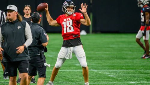 Falcons quarterback Kirk Cousins throws a pass during practice at Mercedes-Benz Stadium on August 2, 2024. (Jamie Spaar for the Atlanta Journal Constitution)