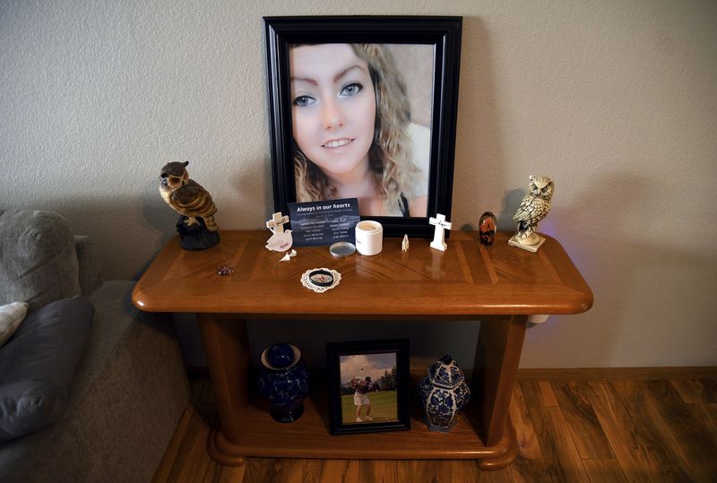 A tribute to Rikki Olds, who was fatally shot along with nine other people at a grocery store in Boulder, Colo., in 2021, is set up in her grandmother's home in Lafayette, Colo., Tuesday, Aug. 27, 2024. (AP Photo/Thomas Peipert)