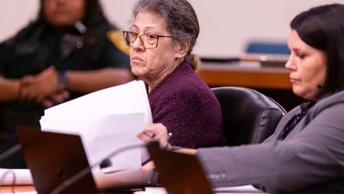 Susan Lorincz, left, listens to testimony during her trial Wednesday, Aug. 14, 2024 in Judge Robert Hodges' courtroom in Ocala, Fla. as her Defense Attorney Amanda Sizemore also listens. (Doug Engle/Ocala Star-Banner via AP)