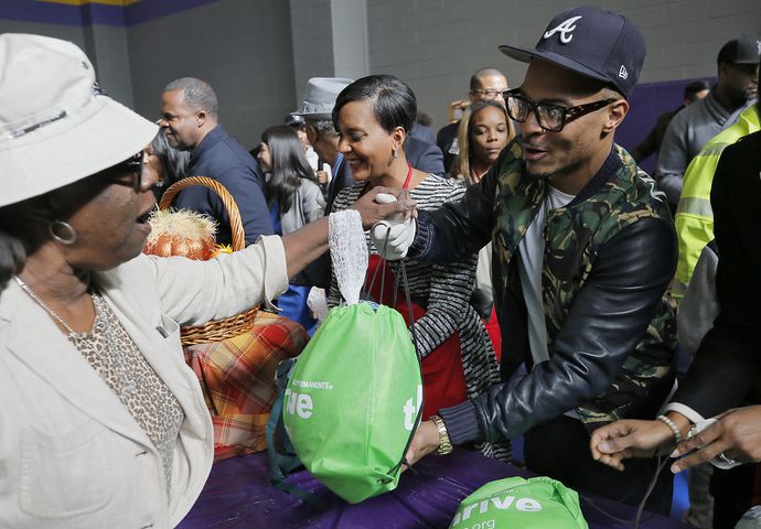 Photos: T.I. as Atlanta community leader