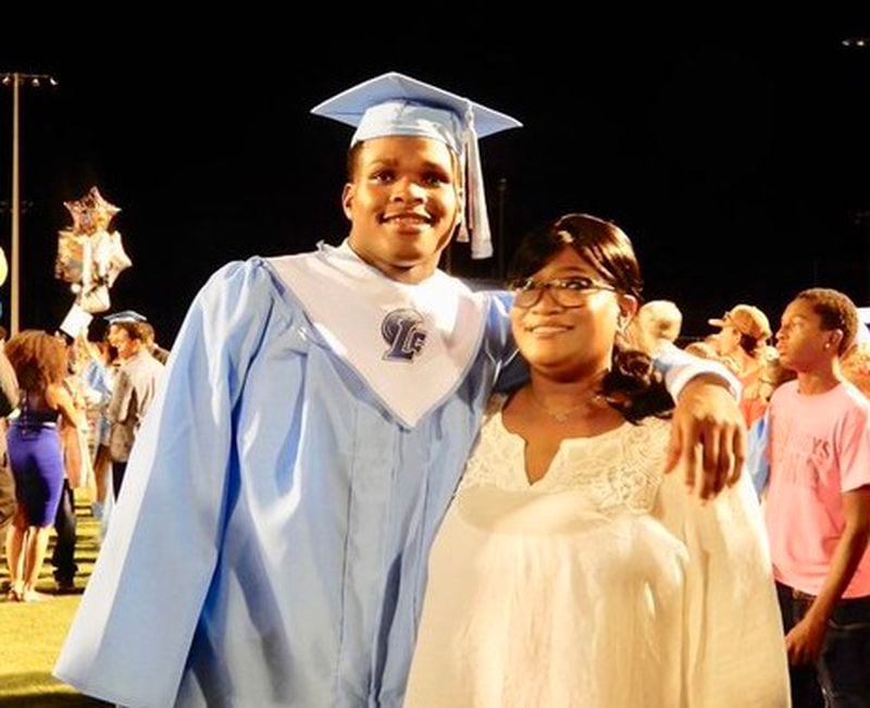 Georgia Tech safety Tariq Carpenter with his mother, Demetria Fiffie, at his graduation from Long County High in southeast Georgia in May 2017. Carpenter said that his mother being able to attend "was something that meant a lot to me." (Photo courtesy Demetria Fiffie)