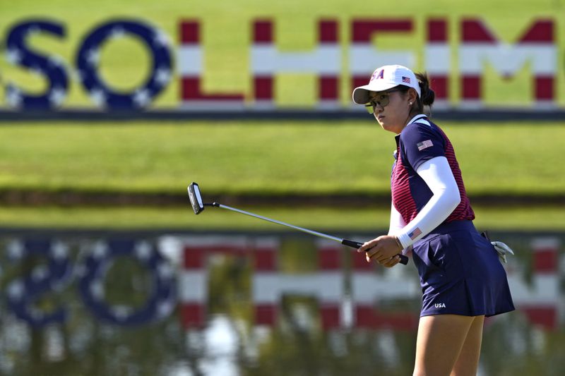 United States' Rose Zhang hits on the fourth green during a practice round prior to the Solheim Cup golf tournament at the Robert Trent Jones Golf Club, Wednesday, Sept. 11, 2024, in Gainesville, VA. (AP Photo/Matt York)