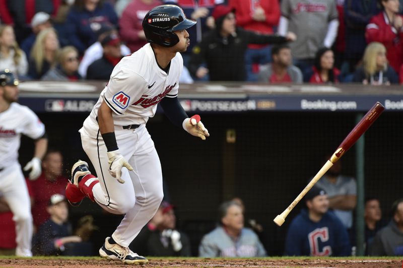 Cleveland Guardians' Steven Kwan watches his single in the sixth inning during Game 2 of baseball's AL Division Series against the Detroit Tigers, Monday, Oct. 7, 2024, in Cleveland. (AP Photo/Phil Long)