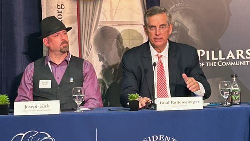 Georgia Secretary of State Brad Raffensperger and Bartow County Election Supervisor Joseph Kirk speak at a gathering of swing-state election officials in Ann Arbor, MI, on Thursday.