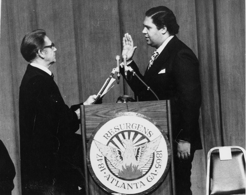 Judge Luther Alverson (left) administers oath of office to Maynard Jackson in 1974.
