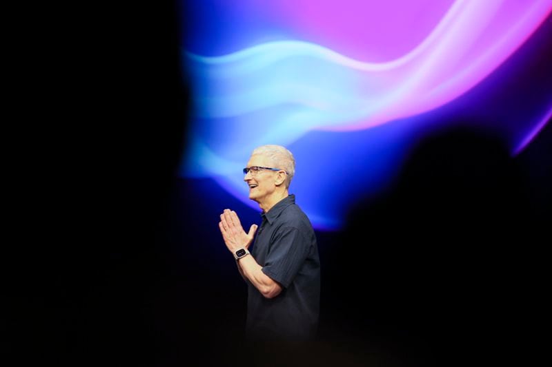 Apple CEO Tim Cook walks on the stage during an announcement of new products at Apple headquarters Monday, Sept. 9, 2024, in Cupertino, Calif. (AP Photo/Juliana Yamada)