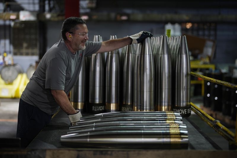 A steel worker manufactures 155 mm M795 artillery projectiles at the Scranton Army Ammunition Plant, Tuesday, Aug. 27, 2024, in Scranton, Pa. (AP Photo/Matt Slocum)