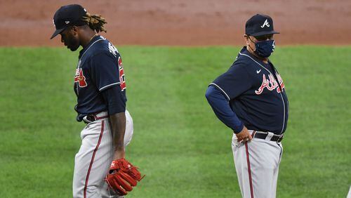 Atlanta Braves starting pitcher Touki Toussaint (62) is removed by manager Brian Snitker (43) during the third inning against the Baltimore Orioles, Monday, Sept. 14, 2020, in Baltimore. (Terrance Williams/AP)