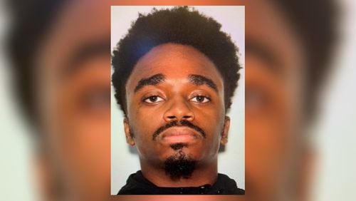 Brackus Golden, 24, was taken into custody on a murder charge in connection with a shooting Sunday evening in the Woodstock area.