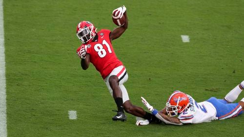 11/7/20 - Jacksonville - Georgia Bulldogs wide receiver Marcus Rosemy-Jacksaint (81) was injured on this touchdown reception during a NCAA football game between the Georgia Bulldogs and Florida Gators in Jacksonville, FL.   (Curtis Compton / Curtis.Compton@ajc.com)  