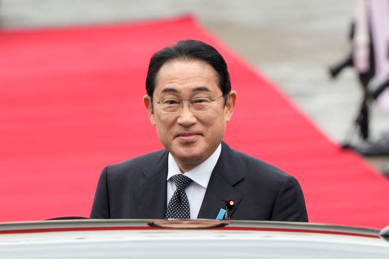 Japanese Prime Minister Fumio Kishida stands to get into a car upon his arrival at Seoul air base in Seongnam, South Korea, Friday, Sept. 6, 2024. (AP Photo/Ahn Young-joon)