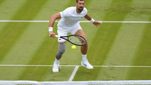 Novak Djokovic of Serbia plays a return during a training session on Court 2 at the All England Lawn Tennis and Croquet Club in Wimbledon, London, Friday, June 28, 2024. The Wimbledon Championships begin on July 1. (AP Photo/Kirsty Wigglesworth)
