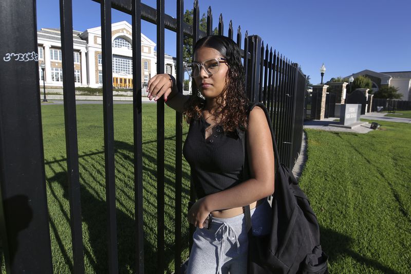 Melinda Gonzalez, 14, poses at Fresno High School where she'll be a freshman in Fresno, Calif., Wednesday, Aug. 14, 2024. (AP Photo/Gary Kazanjian)