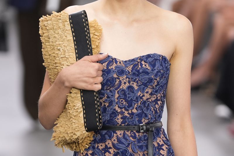 A model walks the runway during the Michael Kors Collection spring/summer 2025 fashion show as part of New York Fashion Week, Tuesday, Sept. 10, 2024, in New York. (AP Photo/Pamela Smith)