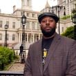 Shamel Kelly poses after a news conference in New York's City Hall Park, Tuesday, Oct. 1, 2024. (AP Photo/Richard Drew)