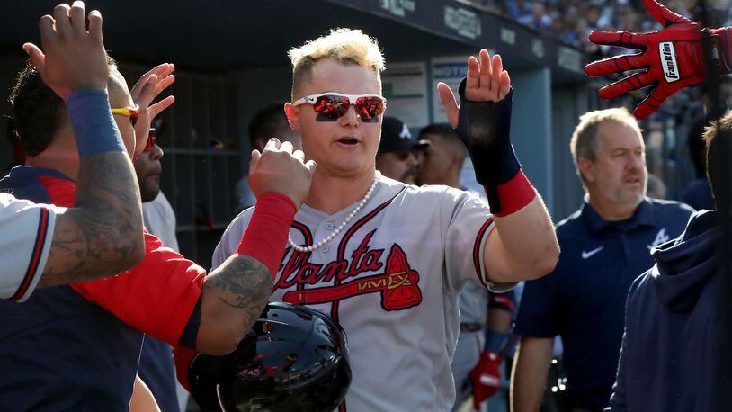 Braves parade: Joc Pederson threw pearl necklaces out to Atlanta fans