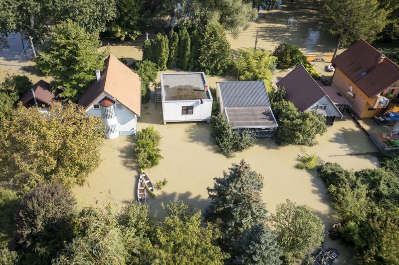 An aerial view of a flooded neighbourhood in Szentendre, Hungary, Thursday, Sept. 19, 2024. (AP Photo/Darko Bandic)