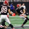 Atlanta Falcons place kicker Younghoe Koo, of South Korea, kicks a game winning 58-yard field goal against the New Orleans Saints during the second half of an NFL football game, Sunday, Sept. 29, 2024, in Atlanta. (AP Photo/Butch Dill)