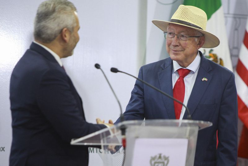 U.S. Ambassador to Mexico Ken Salazar shakes hands with Michoacan state Governor Alfredo Ramírez Bedolla during their joint news conference at the governor's office in Morelia, Mexico, Monday, June 24, 2024. U.S. government inspections of avocados and mangoes will gradually resume in the Mexican state of Michoacan after they were suspended when two USDA employees were assaulted and temporarily held by assailants in Mexico’s biggest avocado-producing state, according to Salazar. (AP Photo/Armando Solis)
